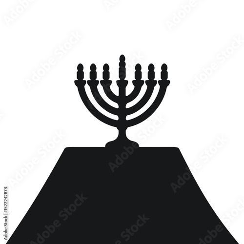 Silhouette of Hanukkah menorah on table, festive celebration