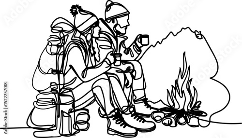 Outdoor couple enjoying hot drinks by a campfire in the mountains  