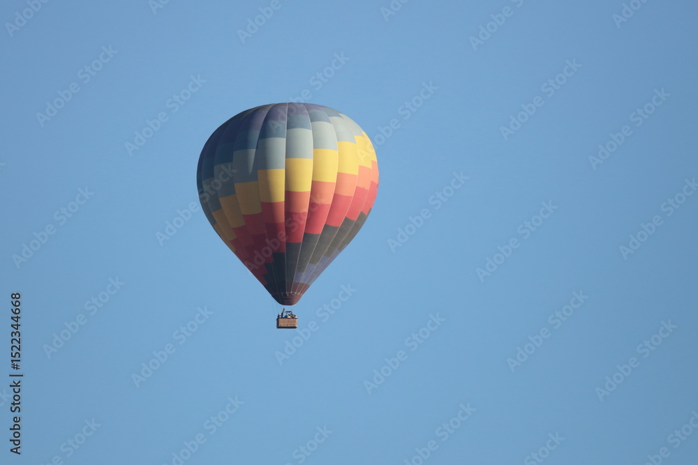 Naklejka premium Hot air balloon in a clear sky, without any clouds