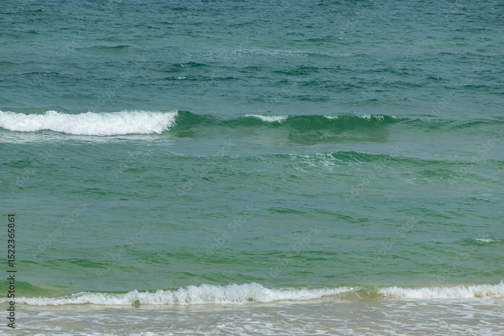 The blue sea on the beach The blue sea on the beach