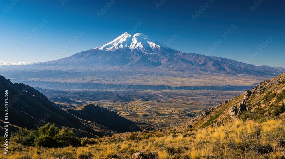 Fototapeta premium Majestic view of the snow-capped peak of Machapuchare in the Himalayas on a clear morning