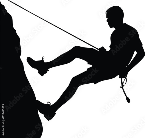 Silhouette of Man Rappelling Down a Cliff Face with Safety Rope in Darkness