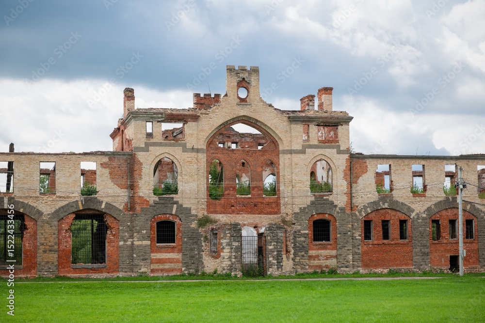 Fototapeta premium Ruins of a Stable. Ruins of a building in the estate of Vladimir Khrapovitsky. Muromtsevo. An architectural monument of the 19th century Neo-Gothic. Vladimir region, Russia