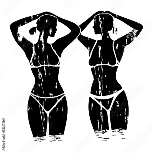 Silhouette of two swimming girls