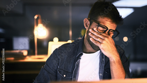 Obraz na plátně Tired, overworked and man with laptop, night or web designer with color sensitivity, sore or vision