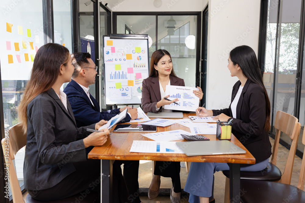 Group of Asian business working plan analysis project brainstorm in modern office, Asian businesspeople team working together, Business startup and company strategy planning concept.
Group of Asian business working plan analysis project brainstorm in modern office, Asian businesspeople team working together, Business startup and company strategy planning concept.