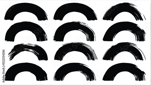 Twelve black brush stroke semicircles arranged in a grid pattern on a white background surface view