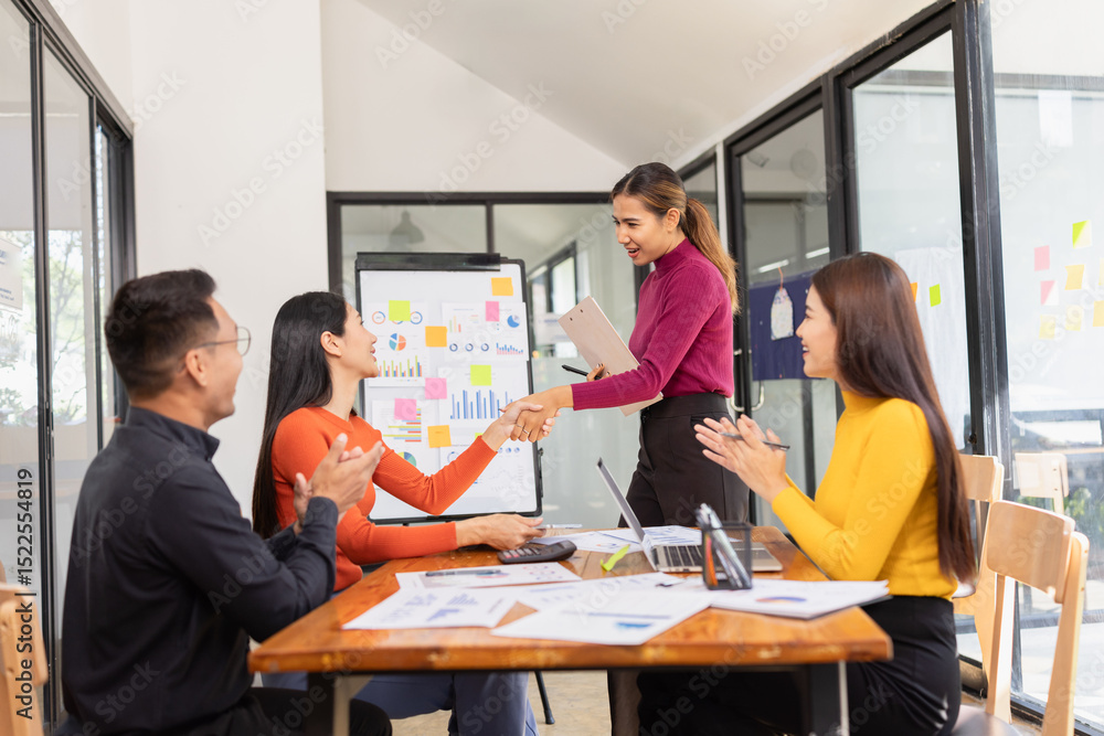 Fototapeta premium Group of Asian business people working together and presentation a meeting in office,