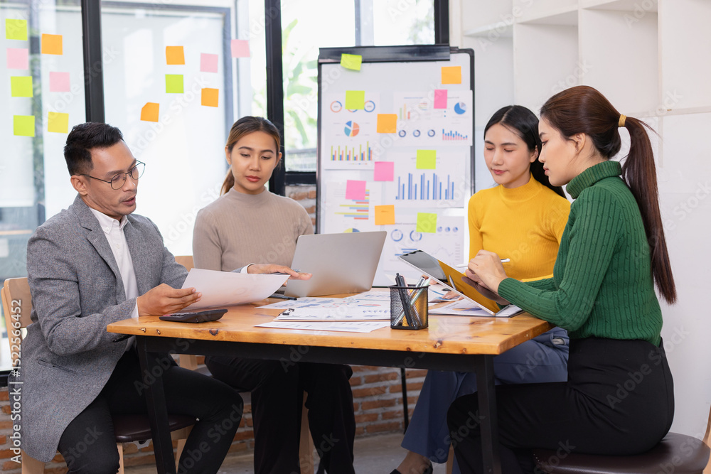 Fototapeta premium Group of business people working together with dashboard analysis and data management in conference room, Corporate business and dashboard to presentation concept.