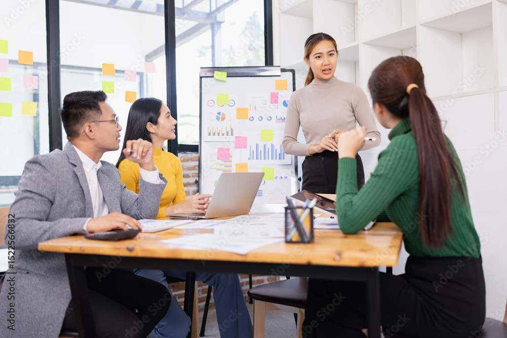 Fototapeta premium Group of business people working together with dashboard analysis and data management in conference room, Corporate business and dashboard to presentation concept.