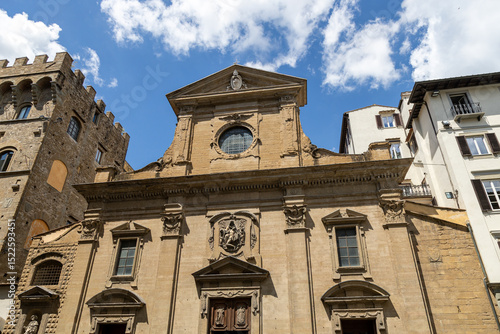 Renaissance-style facade of the Basilica di Santa Trinita, a historic church in the city center of Florence, Italy
