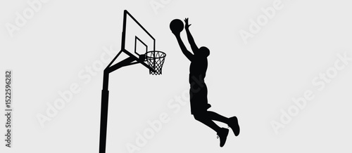 Silhouette of Basketball Player Making a Jump Shot