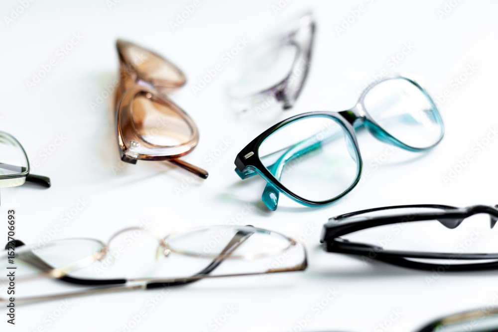 Stylish eyeglasses with lenses on white. Eye care and protection concept Stylish eyeglasses with lenses on white. Eye care and protection concept
