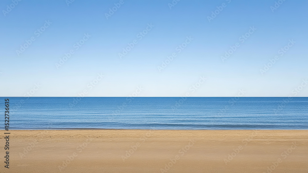 Fototapeta premium A serene blue ocean surface bordered by a brown sandy beach, with minimal details symbolizing harmony between sky and land. 