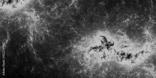 Abstract grayscale texture depicting interwoven, cloudy, and fibrous patterns resembling cosmic dust or neural filaments. Cosmic nebula or microscopic biological network seen through an electron