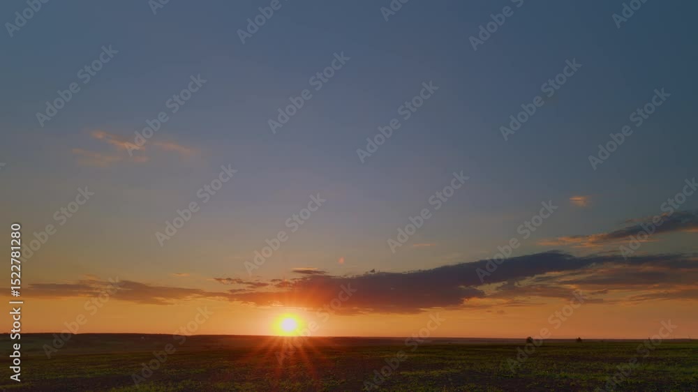 The breathtaking sunrise illuminates the tranquil landscape, creating a picturesque moment Time lapse. The breathtaking sunrise illuminates the tranquil landscape, creating a picturesque moment Time lapse.