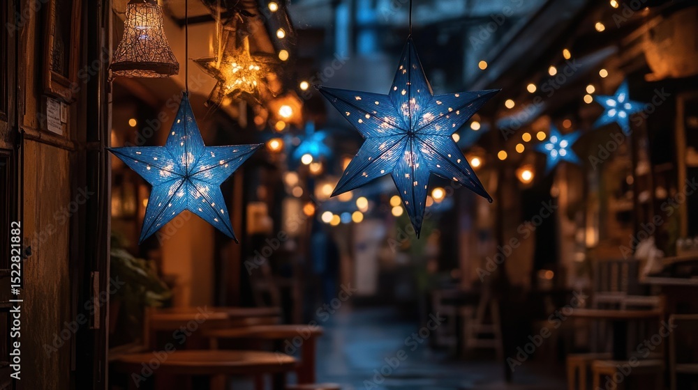 Obraz premium Blue star lanterns illuminate night market alley