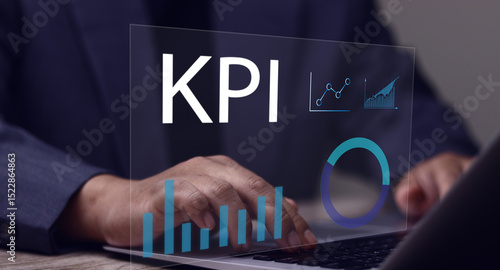 Unveiling Key Performance Indicators: A modern business professional, interacting with a virtual display showcasing KPI metrics.Businessman Analyzing Key Performance Indicators (KPI)