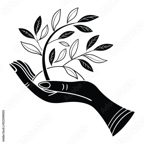 Hand holding branch of life growth nature