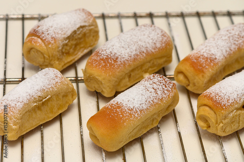 фотографія Fresh Parker House Rolls Cooling on Wire Rack from Oven