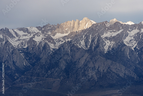 The Sun Breaks Through Onto The East Face Of Mount Whitney