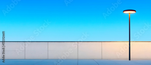 Empty Urban Scene With Light Post Under Clear Blue Sky