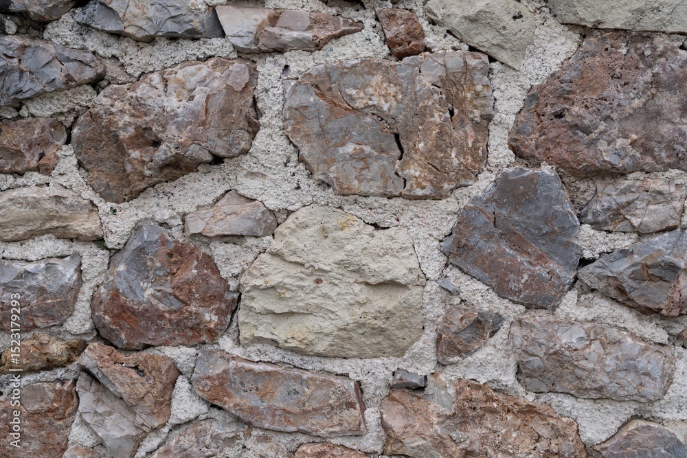 Fototapeta premium Old Rough Stone Wall Texture – Natural Masonry Background for Architectural Design
