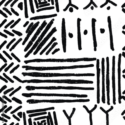 Ethic hand drawn texture. Seamless pattern with geometric elements isolated on white.