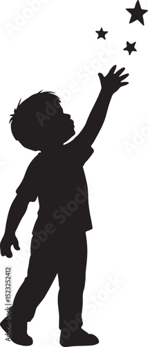 silhouette of a young boy try to touching stars
