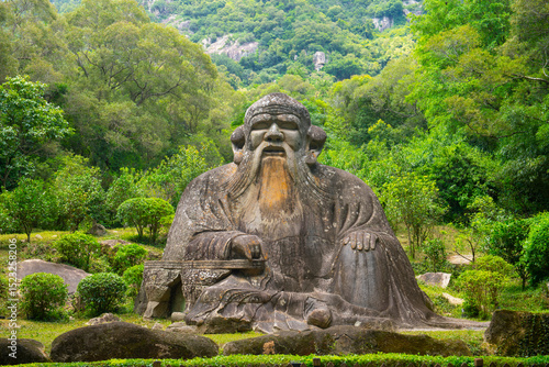 Stone statue of Laozi (Lao Tzu) at the foot of Mount Qingyuan, Quanzhou City, Fujian, China. This statue was carved one piece stone 1000 years ago, and now is a World Heritage Site. 