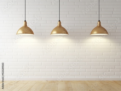 Three illuminated gold pendant lamps hang against a white brick wall above a light wood floor
