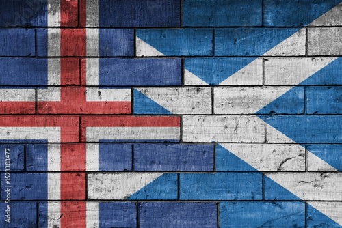 colourful painted big national flag of scotland and flag of iceland on a massive old brick wall background. concept