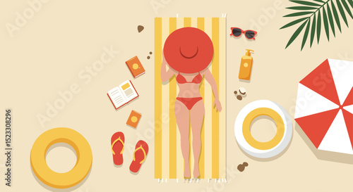 Overhead view of woman in pink bikini and red hat on beach with essentials