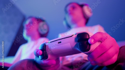 Excited Gamers Kids Brothers Playing Video Game On Console With Gamepad At Home