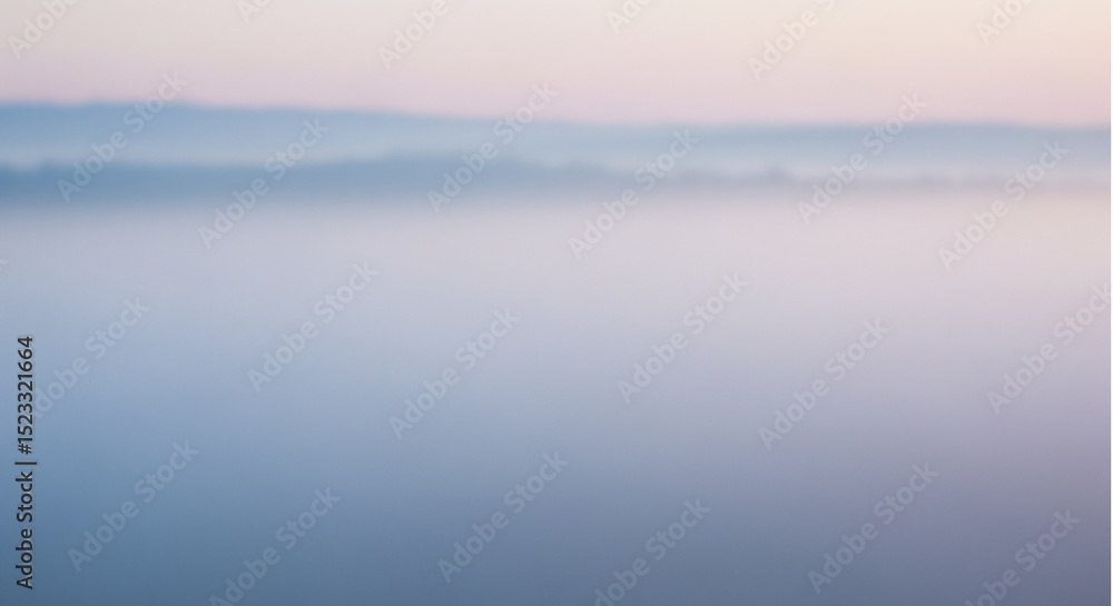 Fototapeta premium Misty Morning Landscape: Serene landscape photo of a misty morning, soft light filtering through the fog, creating a dreamy atmosphere.