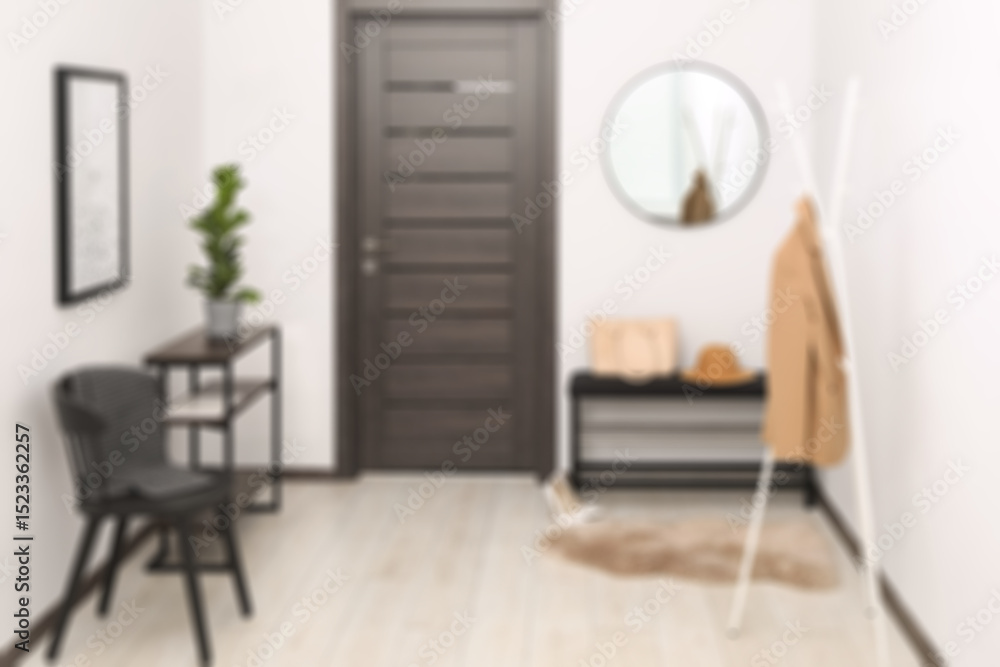 Fototapeta premium Hallway with furniture and door, blurred view