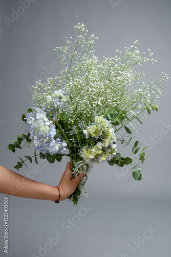 hand holding flowers