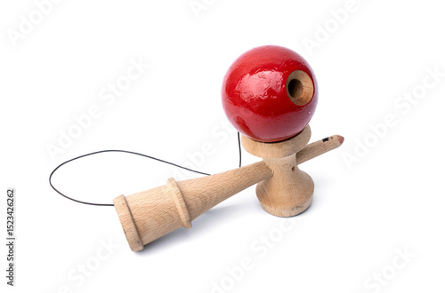 Vintage Old toys that have been played with there are traces damage of play. Cup and ball game Kendama traditional wooden japanese skill toy isolated on white background.