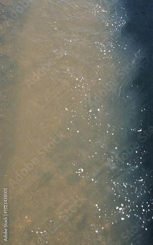 The water is brown and murky