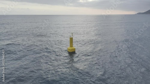 Yellow navigational buoy. drone view, drone video