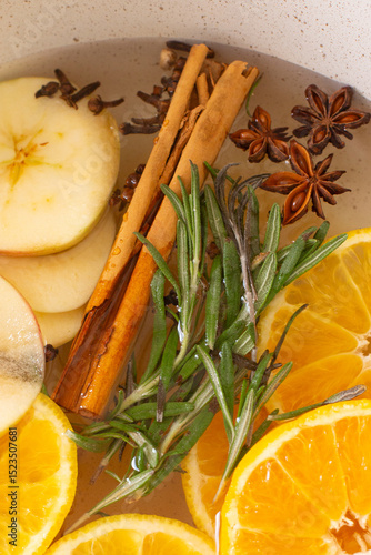 cinnamon, rosemary, oranges, apple, cloves and star anise in a simmer pot for natural aromatherapy