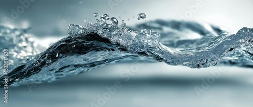 Explosive water splash rising from a curved wave in high-speed clarity, with crisp droplets suspended midair and clean lighting