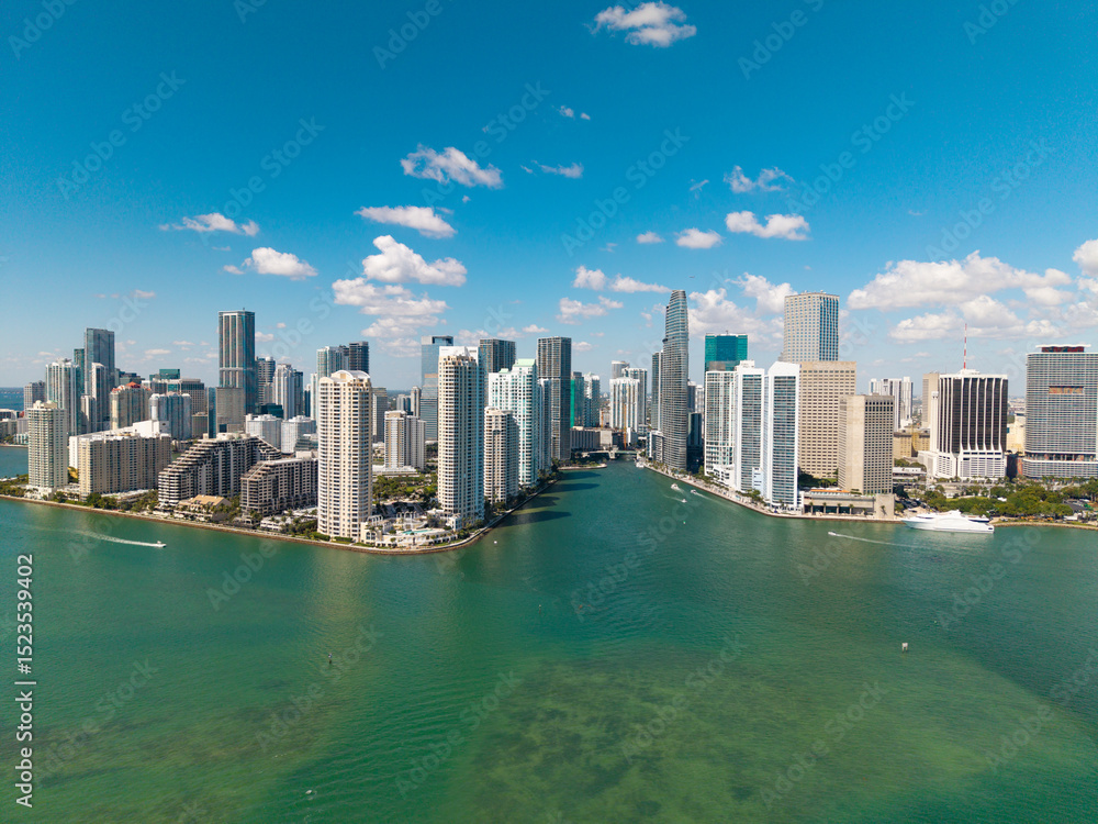 Obraz premium Panoramic modern architecture in Miami downtown, Florida. Miami skyline panoramic view. Aerial view of cityscape with skyscraper in Brickell Key, United States. Downtown Brickell Miami