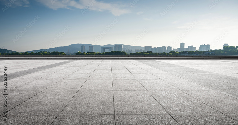 Fototapeta premium Serene Urban Landscape with Expansive Concrete Floor and City Skyline