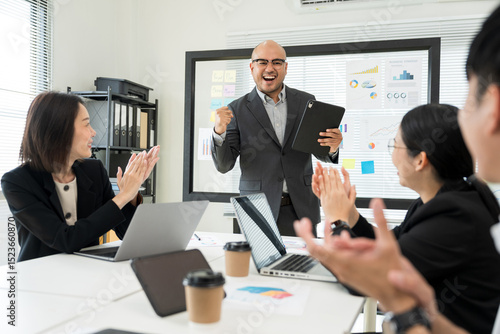 Wallpaper Mural Asian business people team analyzing statistics financial. Group Team of ceo business man and woman Meeting Conference Discussion various topic. Executive professional managers Corporate in office. Torontodigital.ca