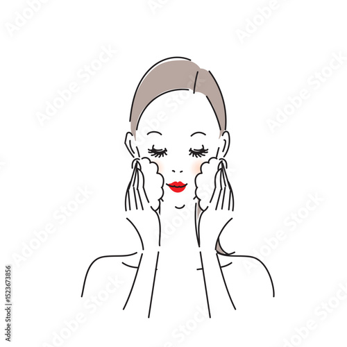 丁寧にスキンケアをする美しい女性