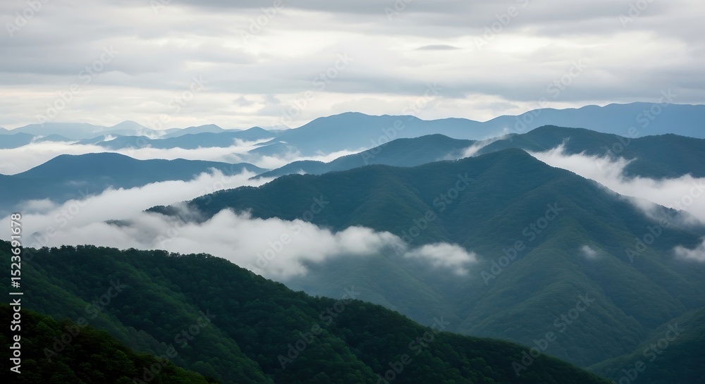 Obraz premium Mountain Range with Low Clouds