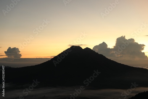 Wallpaper Mural Picturesque view of mountains covered with fog on sunset Torontodigital.ca