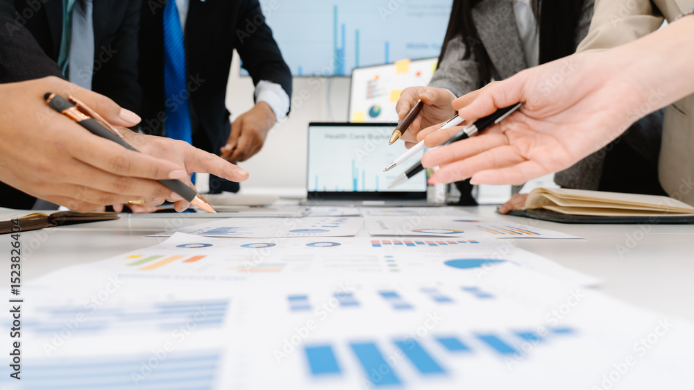 Business Team Analyzing Financial Data Business Team Analyzing Financial Data