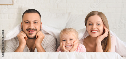 Happy parents with their li...